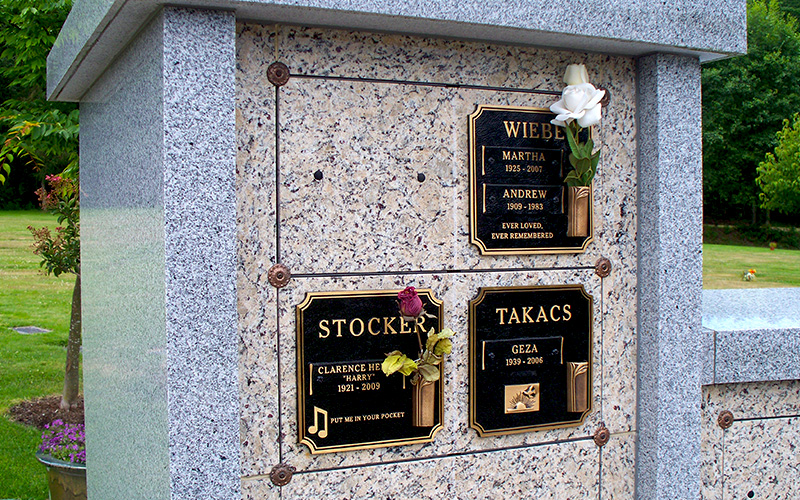 Bronze Memorial Plaque on Monument from Sunset Memorial and Stone